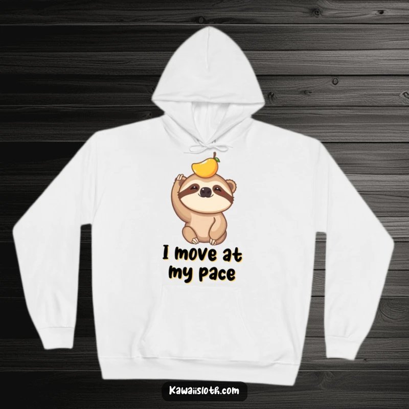 Funny hoodie depicting a sloth with a piece of fruit precariously balanced on its head, highlighting a moment of hilarious concentration.
