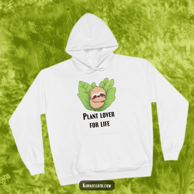 Funny hoodie with a sloth snuggling a leafy plant, radiating peace and comfort. Ideal for relaxation and nature lovers.