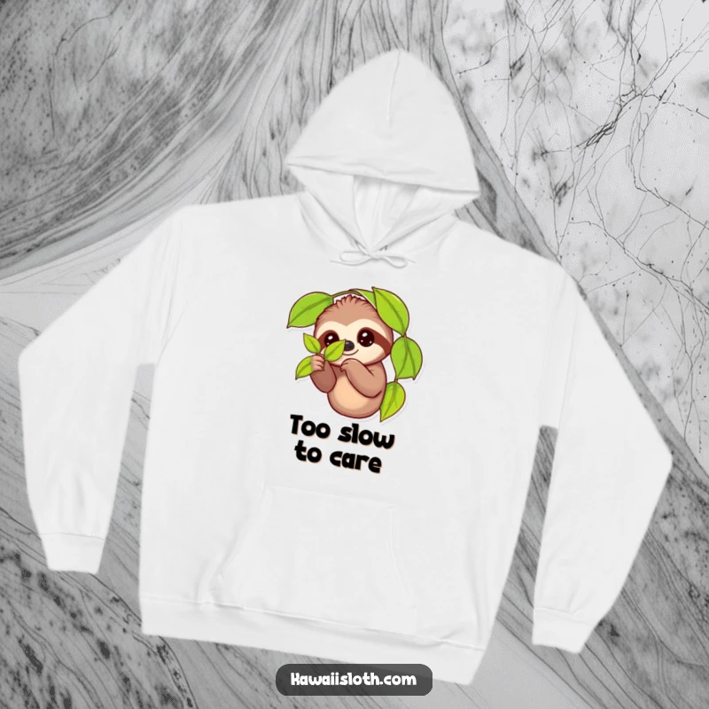Funny hoodie featuring a content sloth holding a vibrant green leaf with a relaxed grip, designed for cozy, humorous, and stylish wear.