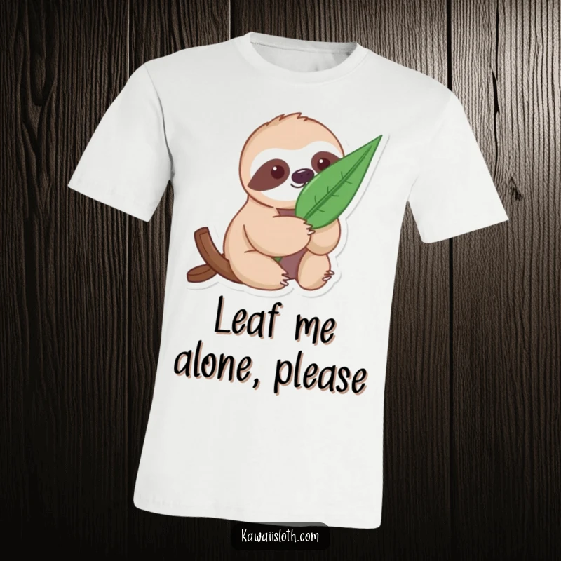Funny Gentle Sloth T-Shirt: a sloth holding a single, large leaf, promoting nature appreciation.