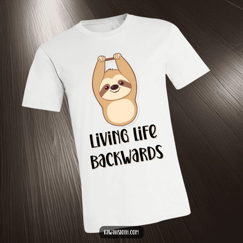 Funny t-shirt depicting a smiling sloth hanging upside down with a contented expression, showcasing ultimate relaxation and humor.